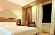 Kamar Tidur 4 Guangzhou Easun Guotai Hotel