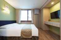 ห้องนอน Western Coop Residence Dongdaemun