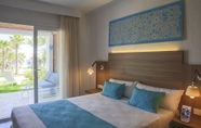 Phòng ngủ 4 Cala Llenya Resort Ibiza