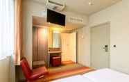 Kamar Tidur 7 Alma Grand Place Hotel