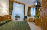 Bilik Tidur 5 Real Caparica Hotel