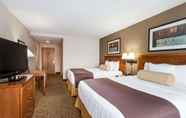 ห้องนอน 7 Days Inn & Suites by Wyndham Fort Pierce I-95