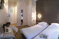 ห้องนอน Hôtel Paris Legendre