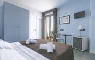 Kamar Tidur 4 Hotel Corallo Rimini