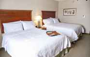 Kamar Tidur 5 Kitchener Inn & Suites