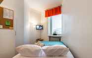 Kamar Tidur 4 Citykoti Downtown Apartments