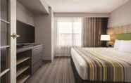 ห้องนอน 4 Country Inn & Suites by Radisson, Green Bay East, WI