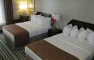 Bedroom 5 Harrisburg Inn and Suites
