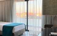 Bilik Tidur 6 Apulia Praia Hotel