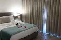Bilik Tidur Apulia Praia Hotel