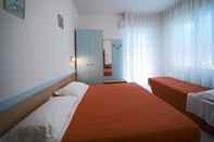 ห้องนอน Hotel Savina