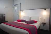 ห้องนอน Hotel De Champagne