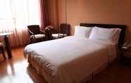 Bedroom 2 Hedong Citycenter Hotel