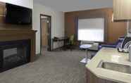Bedroom 5 Holiday Inn Express & Suites Interstate 90, an IHG Hotel