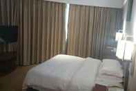 Bedroom GreenTree Inn DongGuan HouJie wanda Plaza Hotel