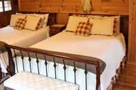 Kamar Tidur Kiwassa Lake Bed & Breakfast