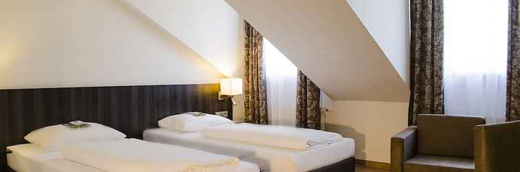 Phòng ngủ GHOTEL hotel & living Kiel