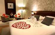 Bilik Tidur 2 Majestic City Retreat Hotel