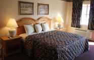 Bedroom 6 Lakeside Inn & Suites