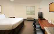 Bedroom 3 WoodSpring Suites Des Moines Pleasant Hill