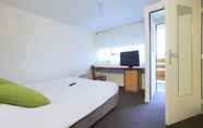 Bedroom 4 Kyriad Direct Le Bourget - Gonesse