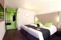 Bedroom Hotel Campanile Les Ulis