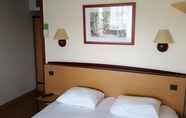 Kamar Tidur 3 Hotel Campanile Aurillac