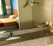 In-room Bathroom 4 Luxury Inn & Suites Forrest City