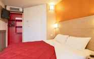 Bedroom 5 Premiere Classe Toulouse Ouest - Blagnac Aéroport