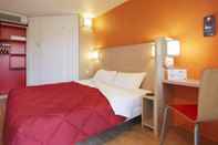 Bedroom Premiere Classe Toulouse Ouest - Blagnac Aéroport