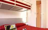 Bedroom 4 Premiere Classe Brive La Gaillarde Ouest