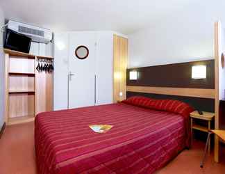 Bedroom 2 Premiere Classe Grenoble Nord - Moirans