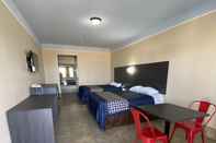 Kamar Tidur Texas Inn and Suites McAllen at La Plaza Mall and Airport