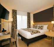 Bedroom 5 Residhome Apparthotel Paris Massy