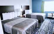 Kamar Tidur 6 Capital Inn and Suites