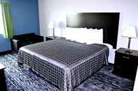 Kamar Tidur Capital Inn and Suites