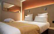 Kamar Tidur 7 Nash Airport Hotel