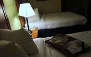 Kamar Tidur 4 Emerald Coast Inn And Suites