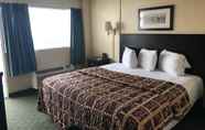Bedroom 7 Red Carpet Inn & Suites