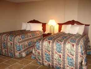 Kamar Tidur 4 Lake Grassy Inn & Suites