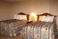 Kamar Tidur Lake Grassy Inn & Suites