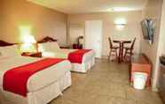 Kamar Tidur 7 Lake Grassy Inn & Suites