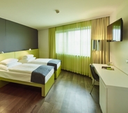 Kamar Tidur 6 PLAZA INN Gasometer