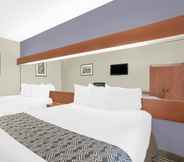 Bedroom 5 Microtel Inn & Suites by Wyndham Bentonville