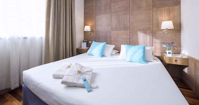 Kamar Tidur iH Hotels Firenze Business