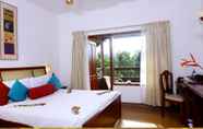 Kamar Tidur 6 Estuary Sarovar Portico Poovar