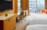 Bedroom 4 New World Wuhan Hotel