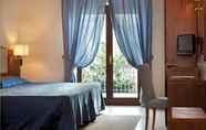 Bilik Tidur 3 Suites & Residence Hotel Napoli