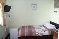 Kamar Tidur Park Avenue Hotel