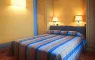 Kamar Tidur 4 Grand Hotel Nizza Et Suisse